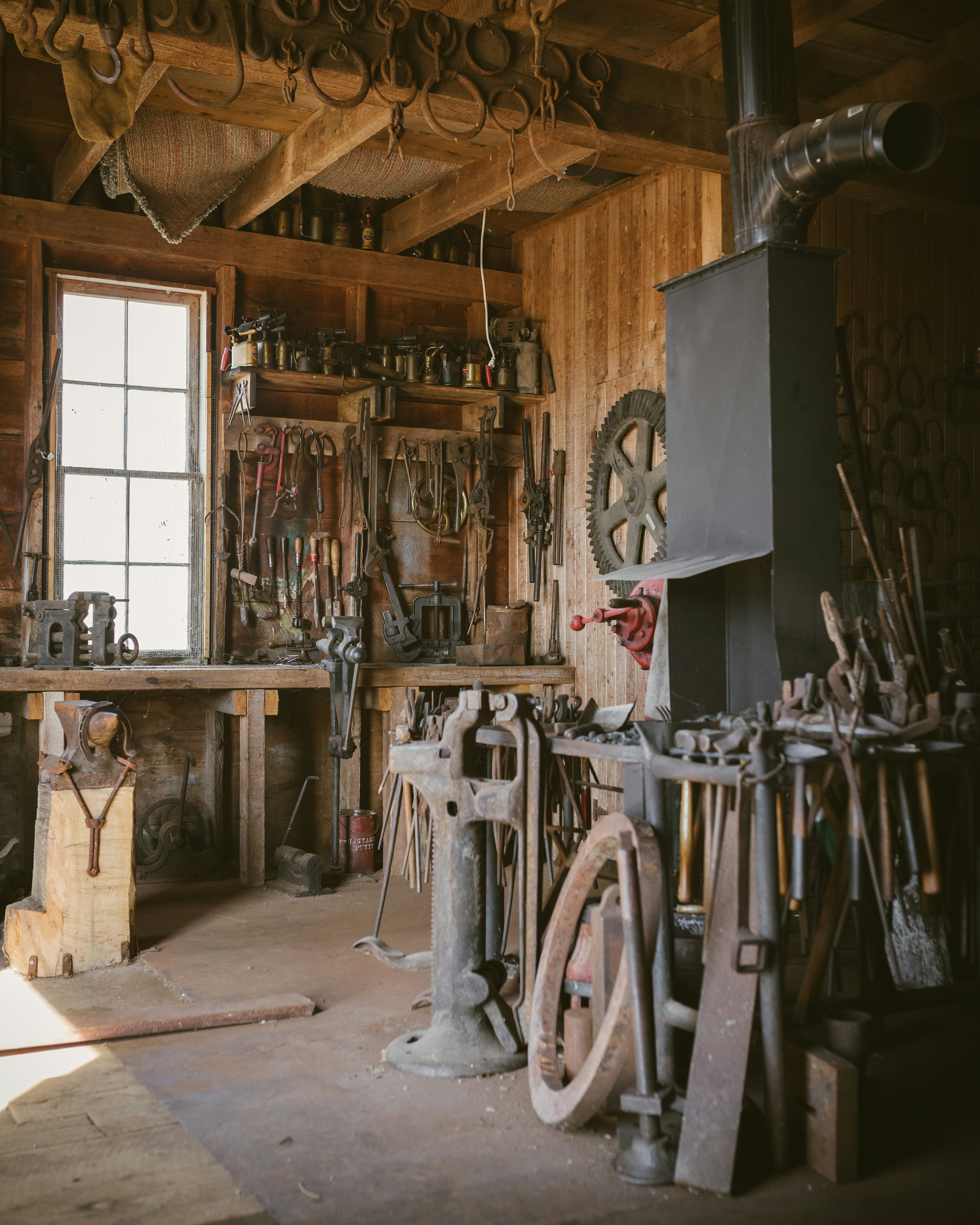 brown wooden cabinet near white and black sewing machine